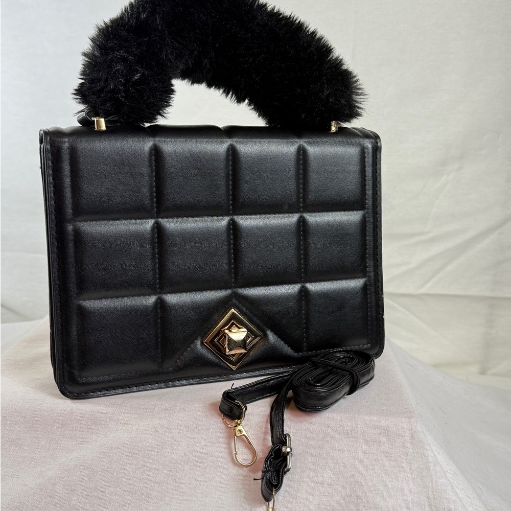 Elegant Black Quilted Handbag with Faux Fur Handle